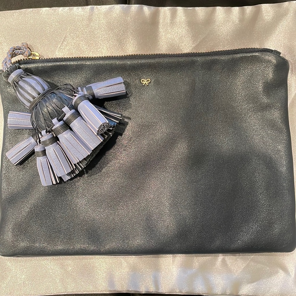 Anya Hindmarch leather clutch with tassel